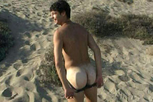 A sexy bloke exposes his ass on the beach while his mate films it - straight guys do love to show off! A sexy bloke exposes his ass on the beach while his mate films it - straight guys do love to show off!