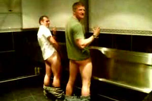 Pissed and pissing at the urinal these blokes looks surprised when someone barges in with a camera and catches them dick in hand! Pissed and pissing at the urinal these blokes looks surprised when someone barges in with a camera and catches them dick in hand!